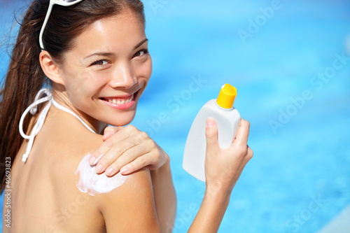 Photo: Sunscreen / sunblock woman Sunscreen / sunblock woman
