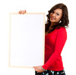 smiling young woman with blank billboard, white background
