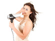 human fashion - beautiful girl drying her hair by dryer