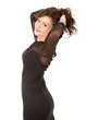 smiling elegant girl in black dress with raised arms