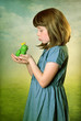Photo: Little girl with a frog prince Little girl with a frog prince