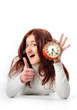 Photo: a woman and a clock a woman and a clock