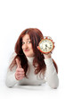 Photo: a woman and a clock a woman and a clock