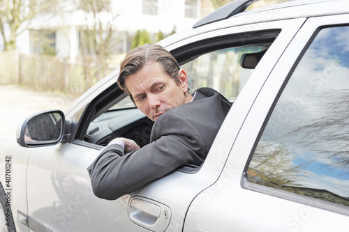 Photo: Mann im Auto Mann im Auto