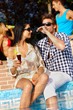 Romantic couple by swimming pool