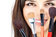 Face behind brushes