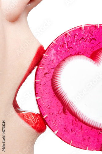 Foto: woman tasting lollipop woman tasting lollipop