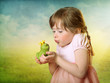 Photo: Little girl with a frog prince Little girl with a frog prince