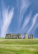 Stonehenge on green grass under blue sky
