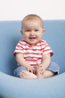 happy toddler with bare feet