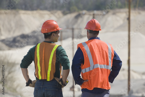 Photo: Two engineers at a gravel and asphalt plant Two engineers at a gravel and asphalt plant