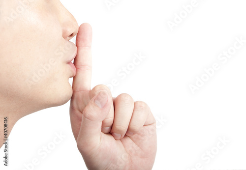 Photo: Young man asking for silence Young man asking for silence
