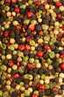 Four seasons pepper grains background Four seasons pepper grains background