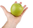 Green apple on the opened palm Green apple on the opened palm