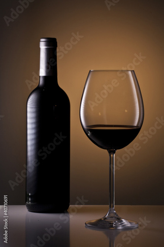 Photo: Glass and bottle of wine Glass and bottle of wine