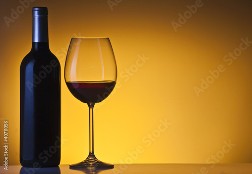 Photo: Glass and bottle of wine Glass and bottle of wine