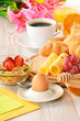 Breakfast with coffee, rolls, egg, orange juice, muesli and chee Breakfast with coffee, rolls, egg, orange juice, muesli and chee
