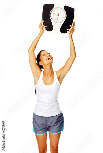 Photo: scale happy woman scale happy woman