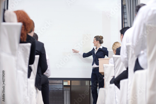 Photo: business woman giving presentation business woman giving presentation