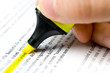 Writing. An hand who writes with an highlighter on a paper Writing. An hand who writes with an highlighter on a paper