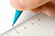 Writing. An hand who writes in a paper sheet with a pencil Writing. An hand who writes in a paper sheet with a pencil
