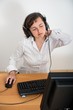 Business woman with neck pain Business woman with neck pain