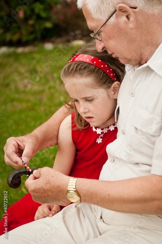 Photo: Happy retirement - grandparent with grandchild Happy retirement - grandparent with grandchild
