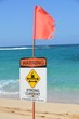 Strong current warning sign and flag