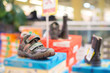 Kids shoes on stand in mall