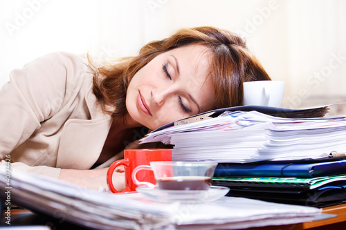 Photo: Tired young woman Tired young woman