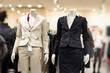 Black and white suits on mannequins in mall