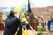 surveyor works with theodolite