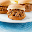 three pulled pork bbq mini sandwhich sliders.