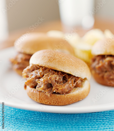 Photo: three pulled pork bbq mini sandwhich sliders. three pulled pork bbq mini sandwhich sliders.