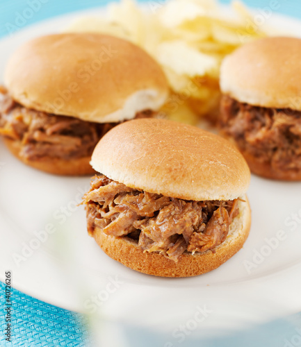 Photo: three pulled pork bbq mini sandwhich sliders. three pulled pork bbq mini sandwhich sliders.