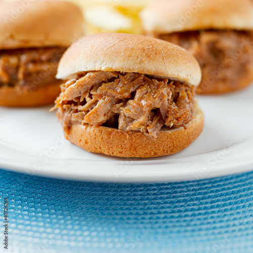 Photo: three pulled pork bbq mini sandwhich sliders. three pulled pork bbq mini sandwhich sliders.