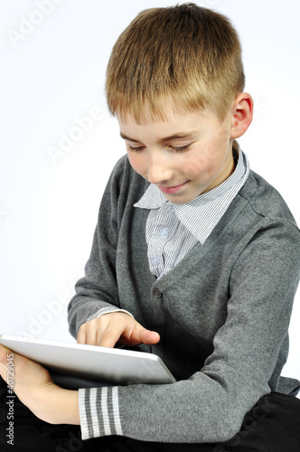 Photo: Boy with touch pad Boy with touch pad