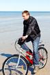 Cyclist at sea.