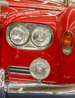 Headlights of a Bright Red Antique Limousine Headlights of a Bright Red Antique Limousine