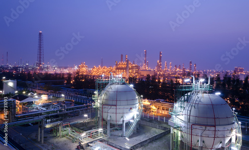 Photo: Gas storage spheres tank in petrochemical plant at night Gas storage spheres tank in petrochemical plant at night