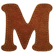 Leather alphabet. Leather textured letter M Leather alphabet. Leather textured letter M