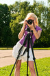 young woman with camera