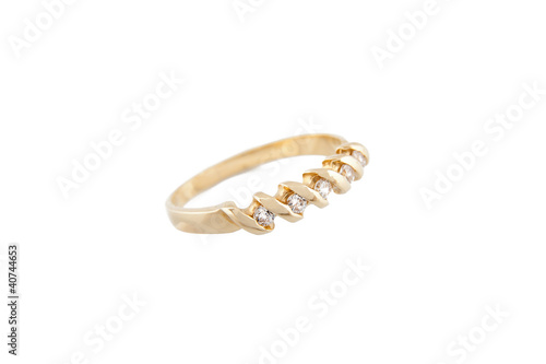 Foto: Gold ring with clear stones on white background Gold ring with clear stones on white background