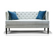 white sofa with two blue pillows  isolated on white background