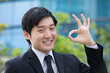 Photo: Asian business man gesturing okay. Asian business man gesturing okay.