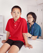 Sick Looking Young Boy at the Doctor's Office