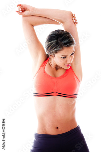 Photo: Fit woman stretching Fit woman stretching
