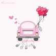 Just married on car driving to their honeymoon