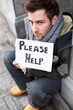 Homeless Young Man Begging In Street