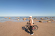 Cyclist at sea.